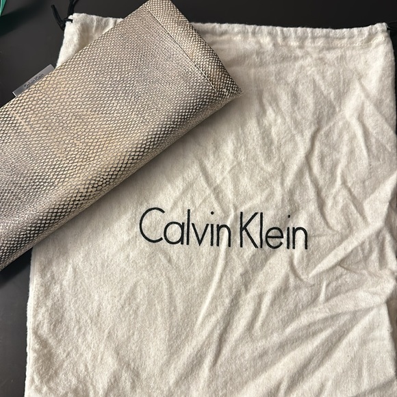 Slim Calvin Klein silver snake print clutch - Picture 13 of 13
